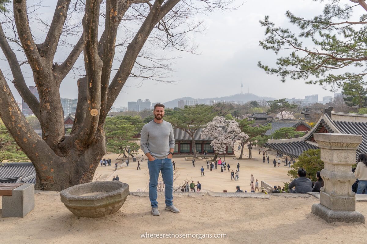 Man posing for a photo at Changgyeonggung Palace