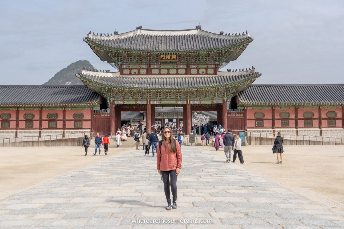 Tourist standing outside Gyeongbokgung Palace in Seoul, South Korea