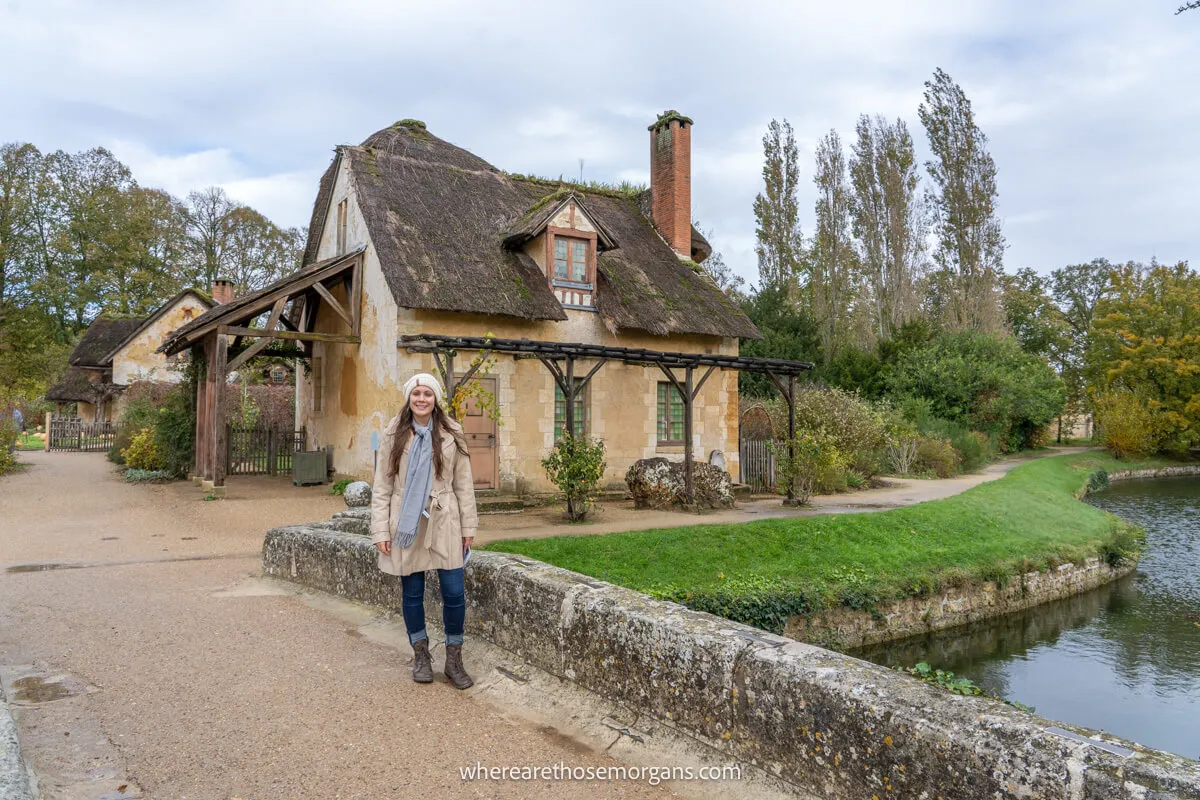 Tourist walking around the unique buildings at the queens hamlet