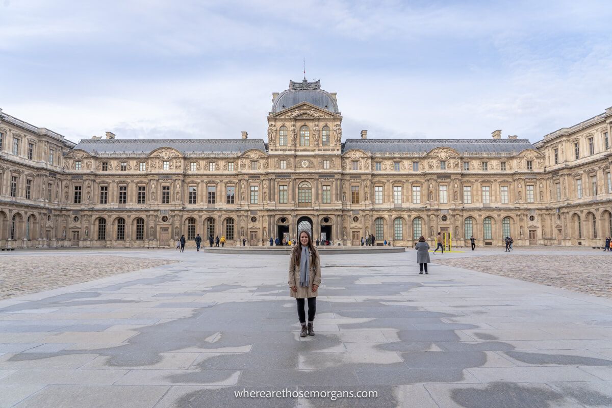 Woman standing outside of a Paris Museum