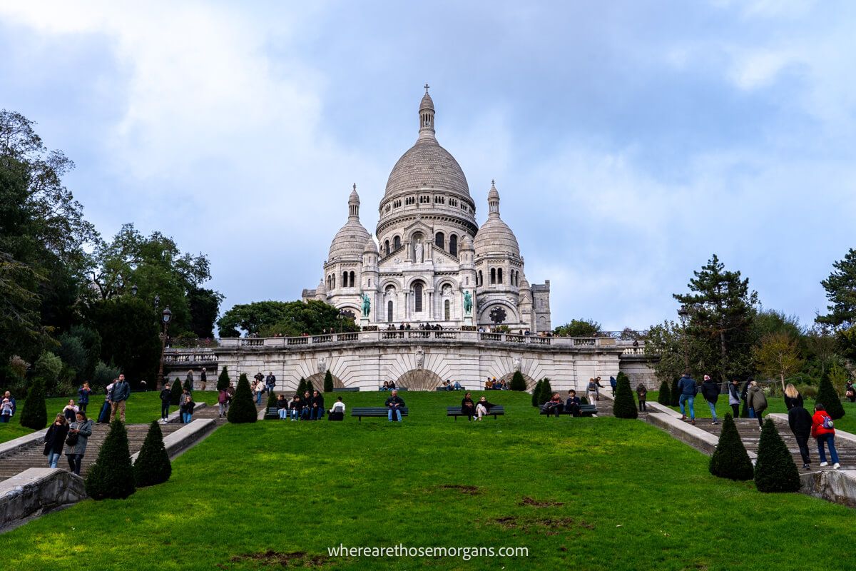 Many tourists enjoying the view of the Sacré-Cœur Basilica