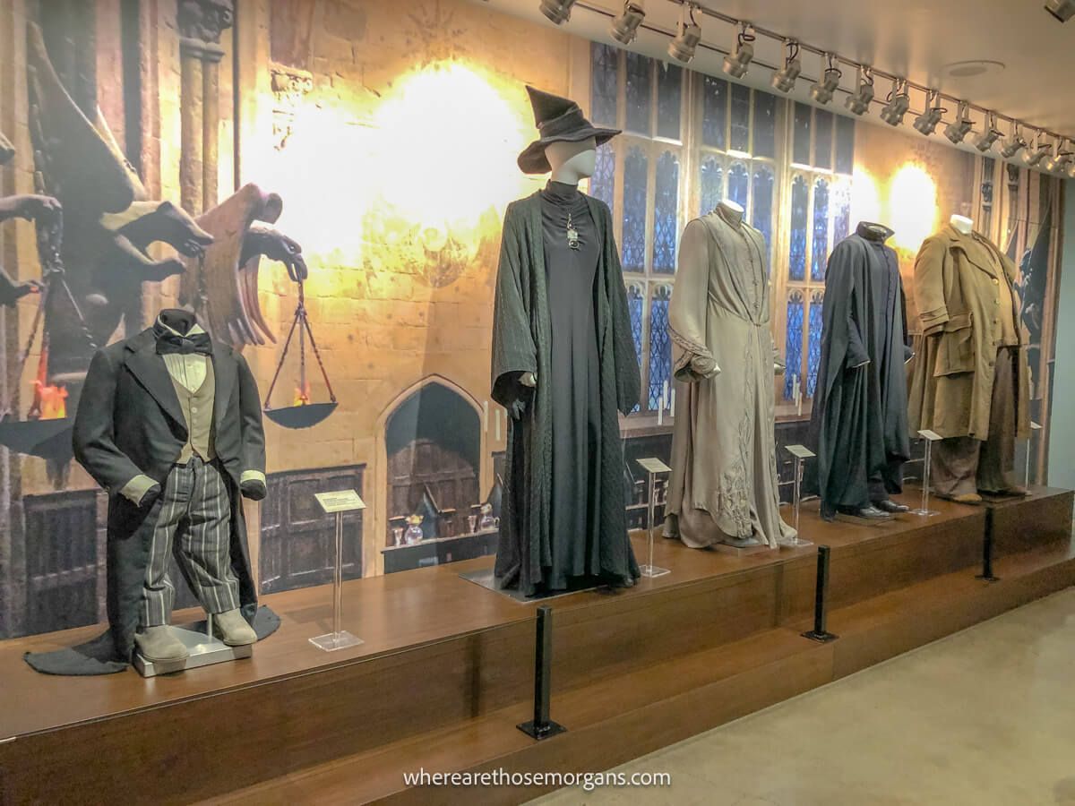 Several Harry Potter costumes on display