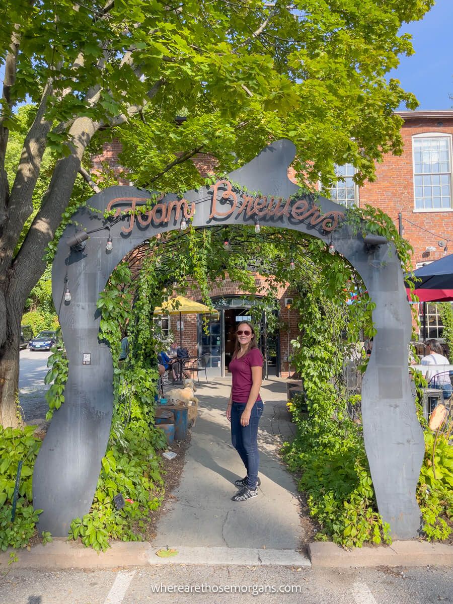 Woman walking into Foam Brewers near Waterfront Park in Burlington