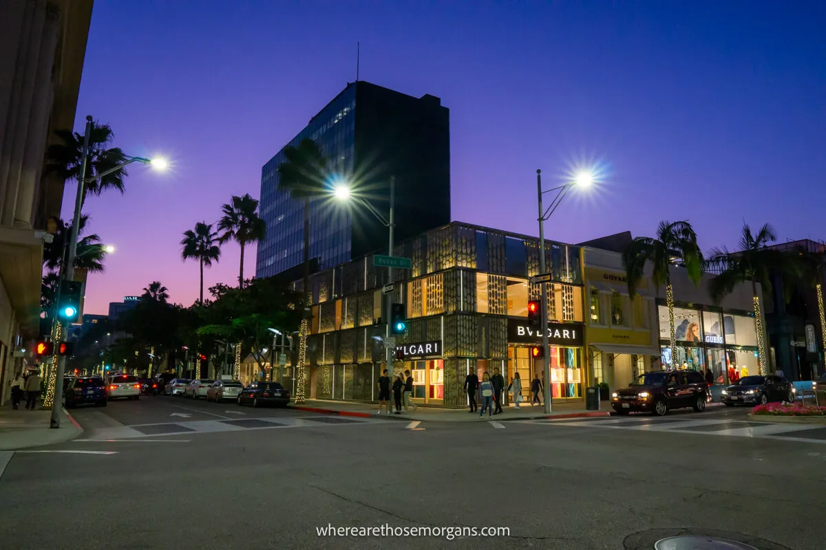 Popular designer boutique stores lit up at night on Rodeo Drive in Beverly Hills