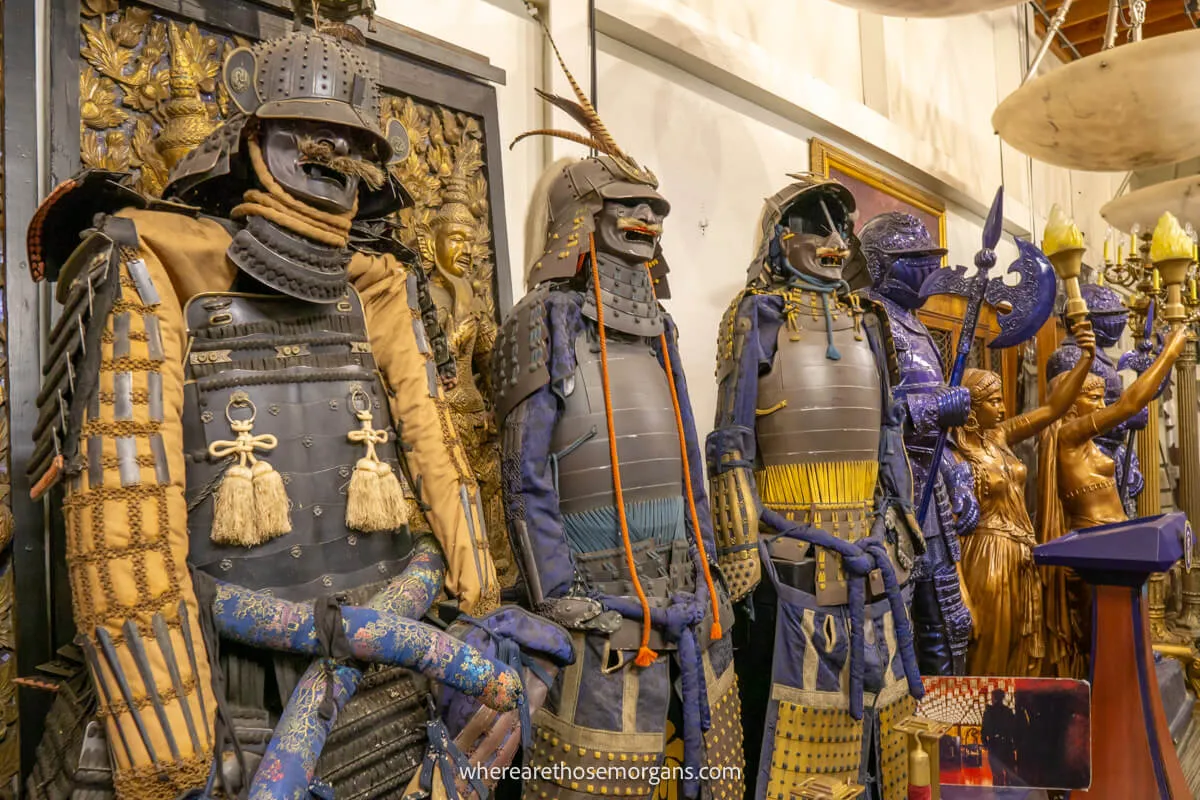 Samurai costumes lined up in a row inside a prop building at Warner Bros studio