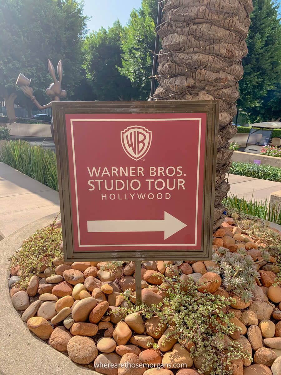 Red sign point the way to the beginning of a studio tour in Hollywood