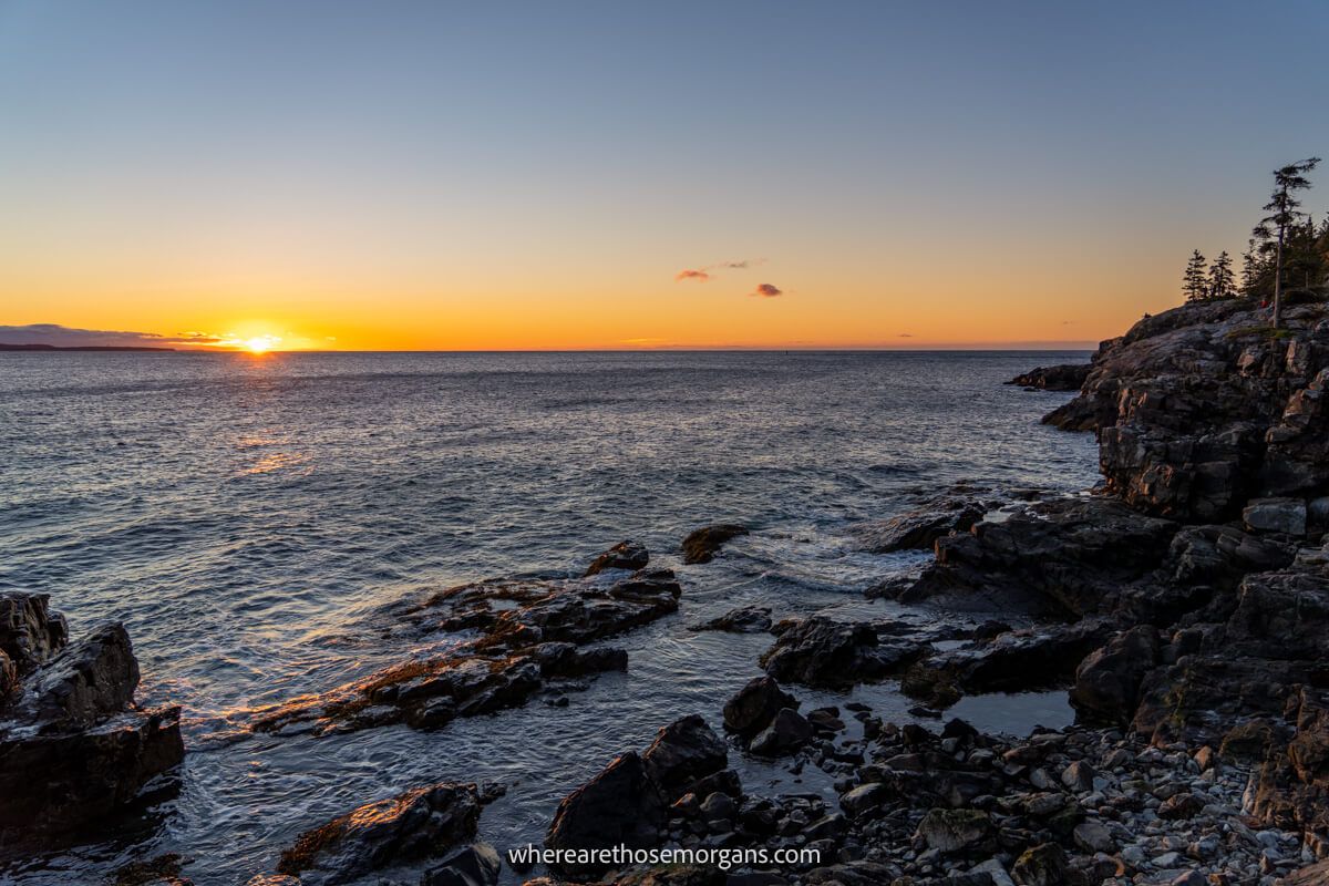 A beautiful sunrise coming over the ocean in Acadia National Park