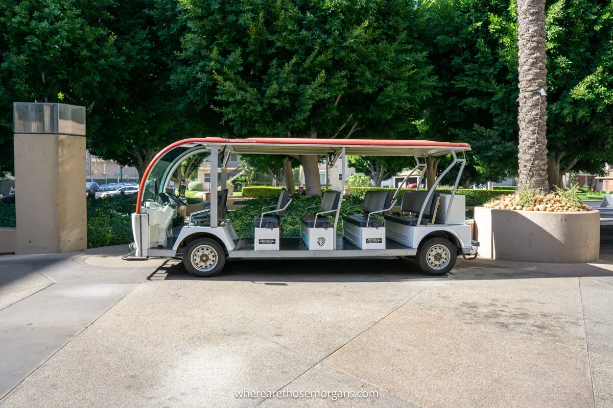 A golf cart waiting to take groups of tourists around the Warners Bros set