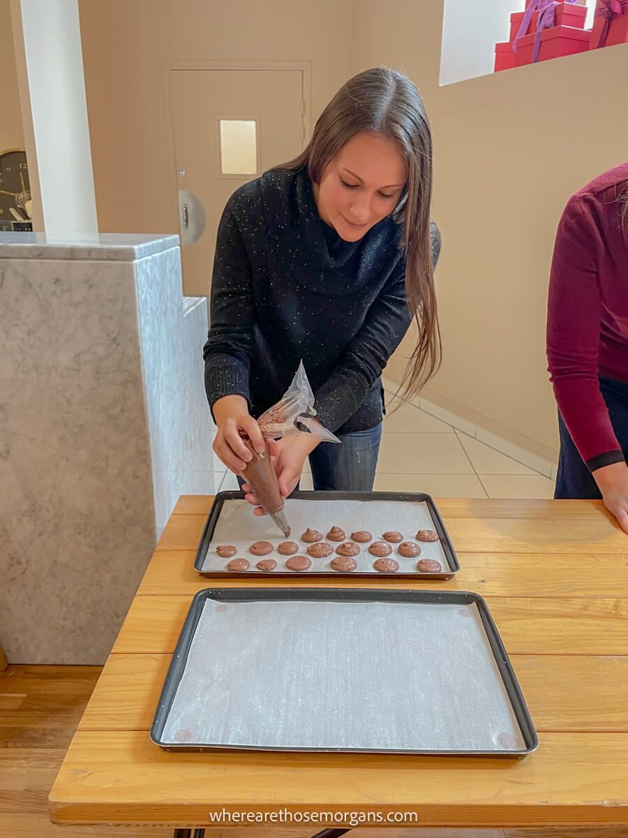 Woman learning how to make macaroons, the famous French pastry