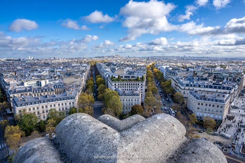 View over Paris architecture and streets from Arc de Triomphe observation deck