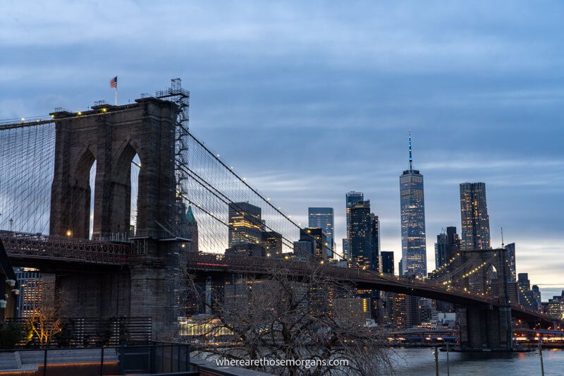 Elevated view over a large bridge and skyscrapers at dusk