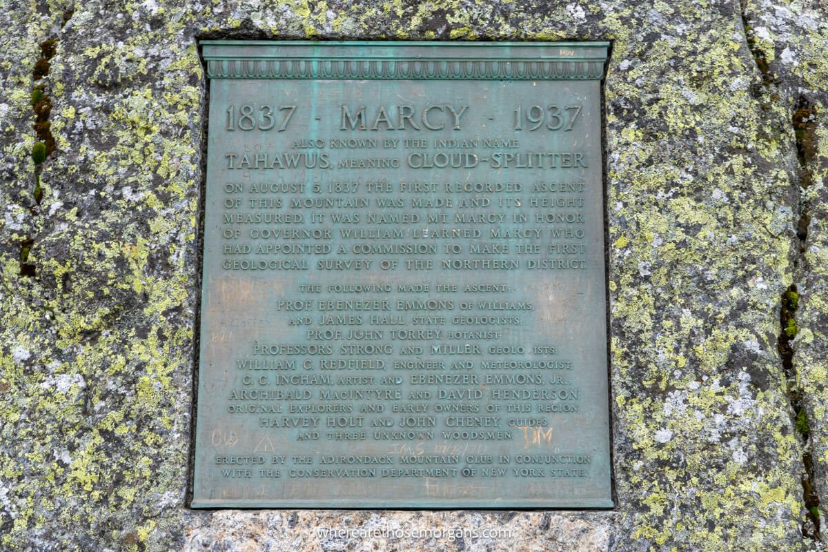 Plaque with writing built into a flat rock at the summit of Mount Marcy in the Adirondack Mountains