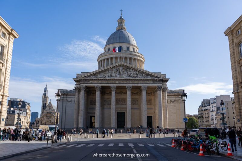 A road leading to the Pantheon with the French flag flying