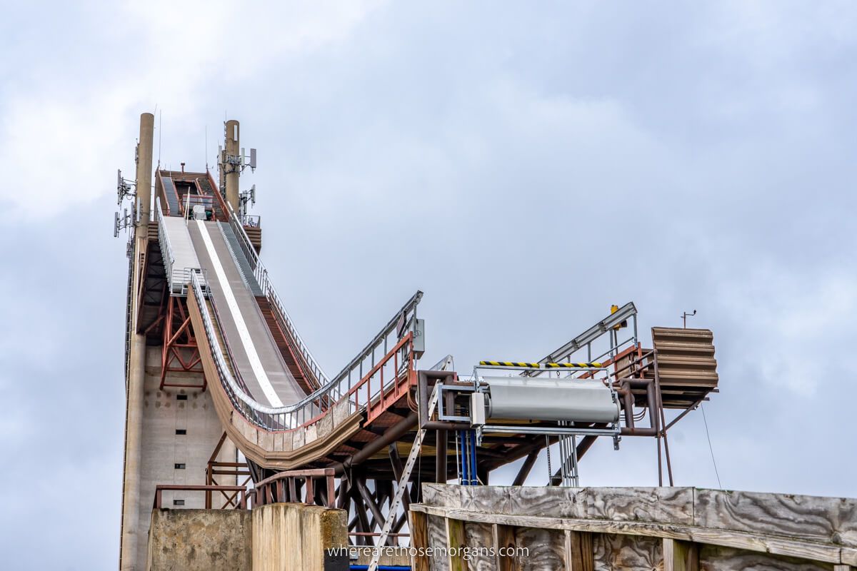 Olympic Ski Jump in Lake Placid NY from below and to the side showing the jumping point and steepness of drop