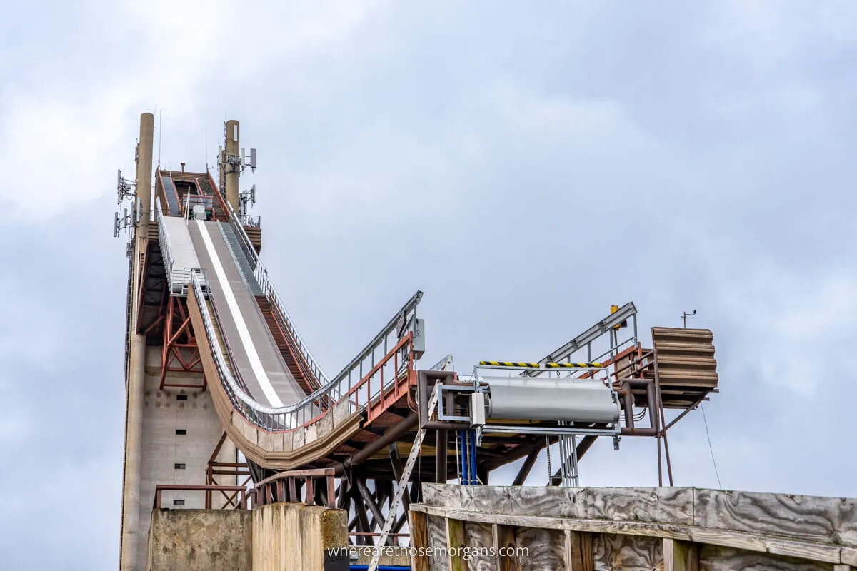 Olympic Ski Jump in Lake Placid NY from below and to the side showing the jumping point and steepness of drop